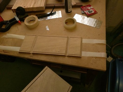 Preparing bottom and side panels for glue-up..